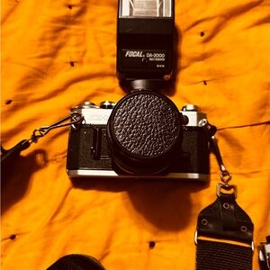 Canon Black and Silver Camera with Flash